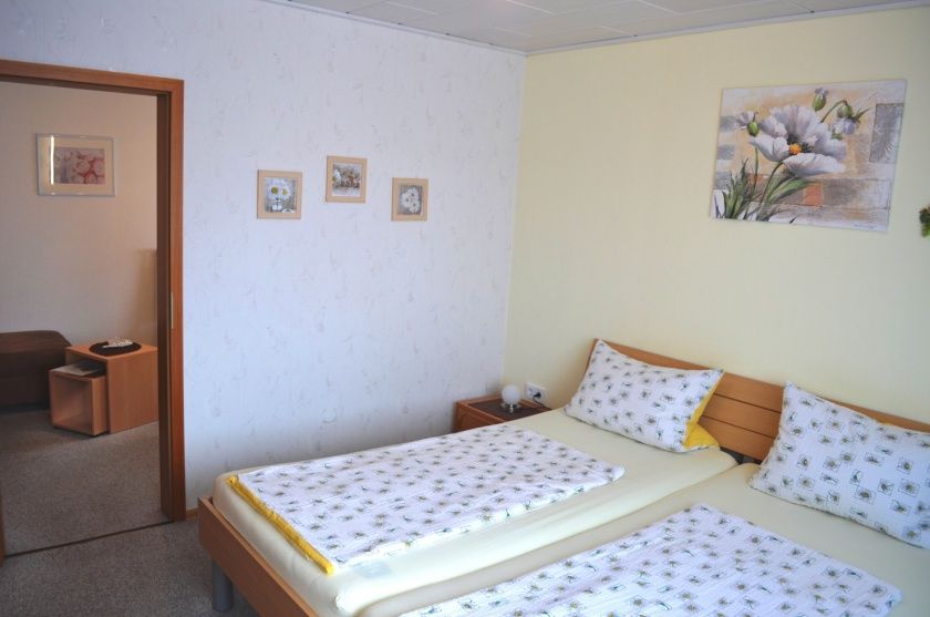 Gästehaus Reinfrank - komfortable Gästezimmer und Ferienwohnung - an der südlichen Weinstraße